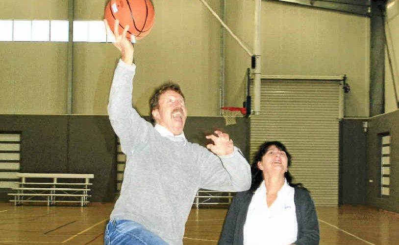 ON TARGET: Basketball Association stalwarts Rob and Dawn Ashdown jump for joy at the news that the Ewingsdale Rd courts are ready to play on. ON TARGET: Basketball Association stalwarts Rob and Dawn Ashdown jump for joy at the news that the Ewingsdale Rd courts are ready to play on.
